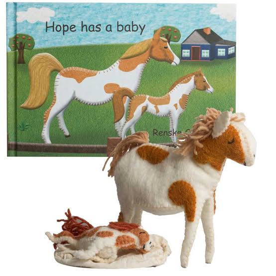 Papoose-Hope has a baby book and Horses